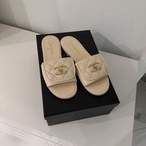CHANEL Cream Quilted Slide Sandals